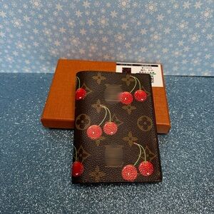 Fashion monogram passport holder
